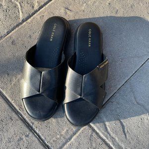 Black Cole Haan Leather Sandals. 1 inch thick flats.